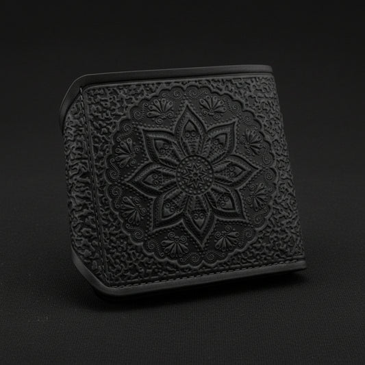 Black textured wallet with a floral design on a white background