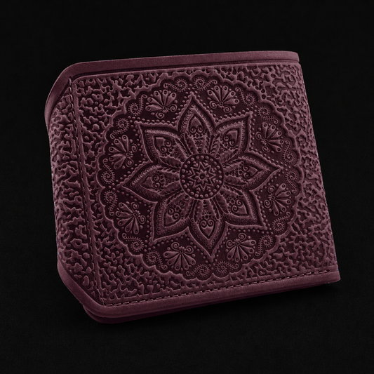 Purple textured wallet with intricate design on a black background
