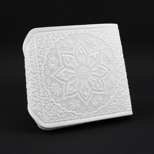 White textured square object on a black background