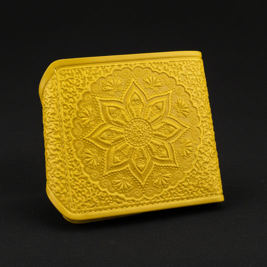 Yellow embossed wallet on a black background