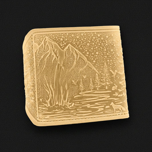 Ivory wallet with nature-themed design on a white background