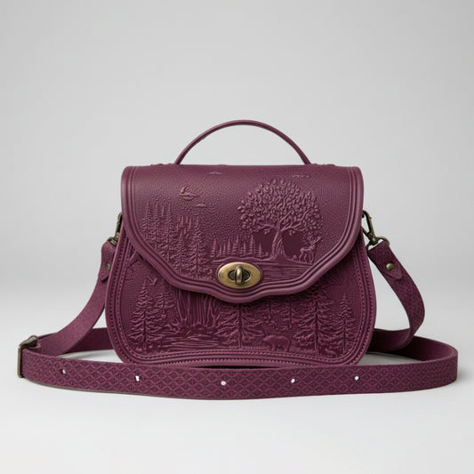 Purple embossed bag with a tree design on a light gray background