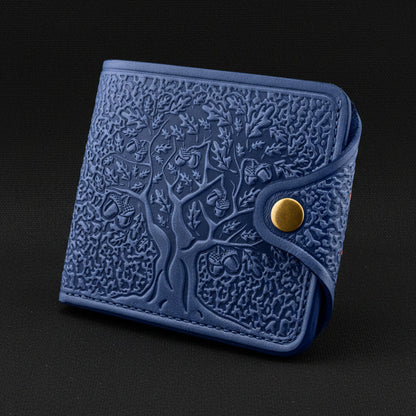 Blue embossed wallet with a gold button on a black background