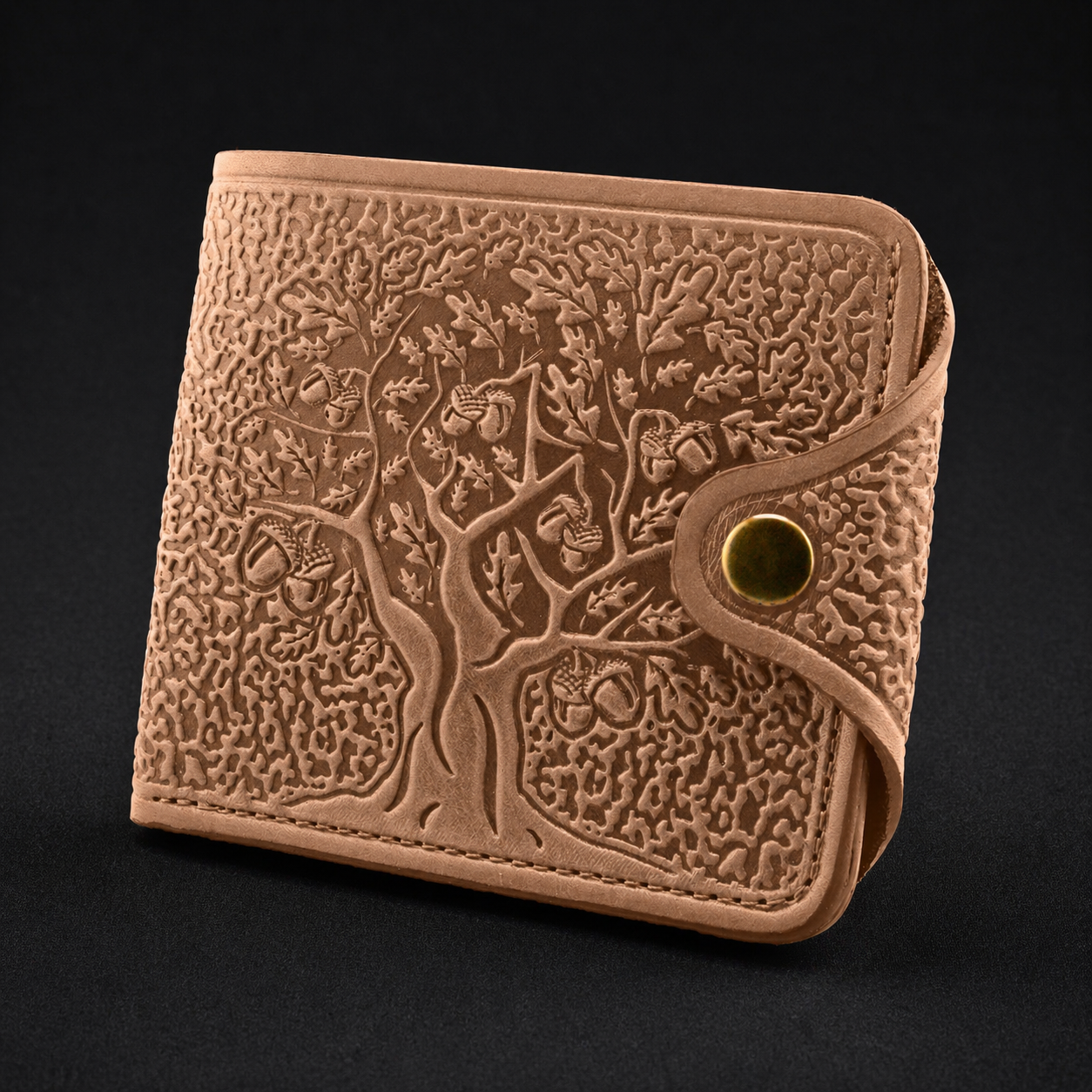 Beige leather wallet with embossed design on a black background