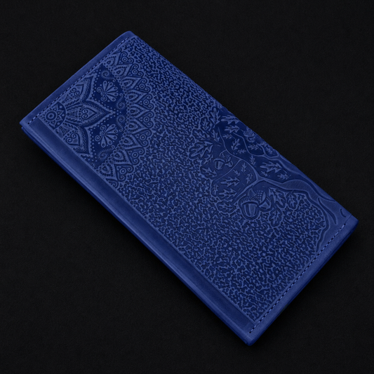 Blue textured wallet with embossed design on a black background