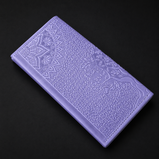 Purple wallet with embossed pattern on a black background