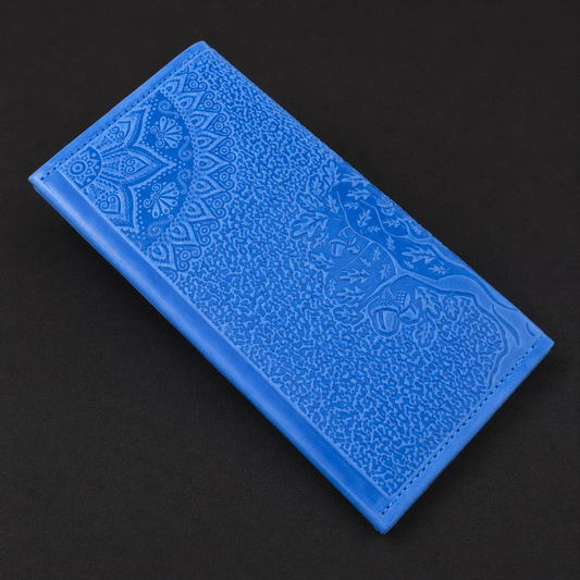 Blue textured rectangular object on a black background