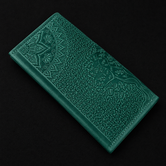 Green embossed wallet on a black background