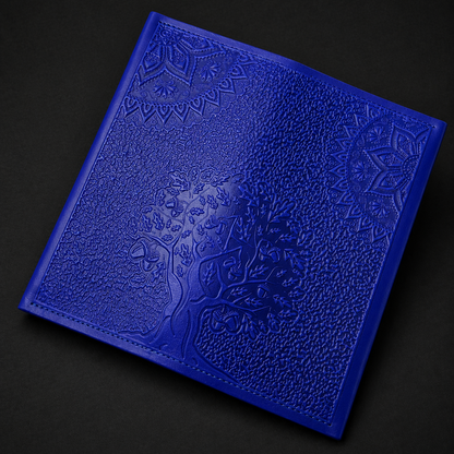 Blue textured notebook on a black background