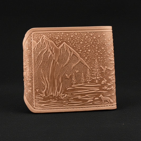 Leather wallet with mountain and nature design on a black background