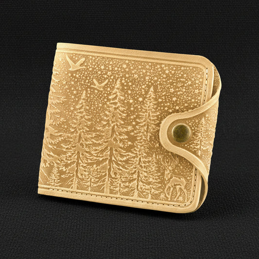 Ivory leather wallet with forest design on a black background
