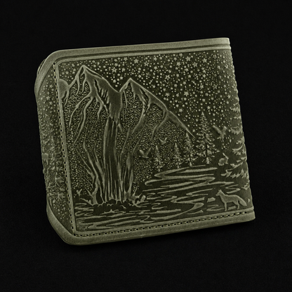 Green wallet with nature-themed design on a black background