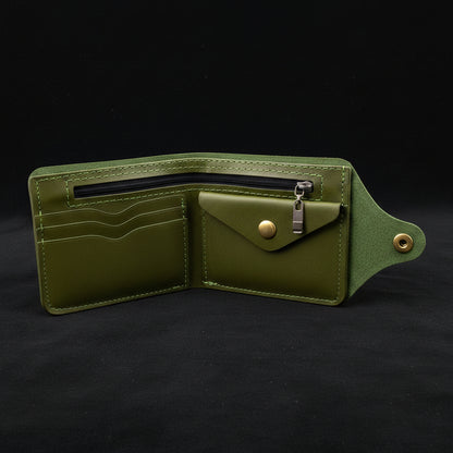 Green leather wallet with zipper on a black background