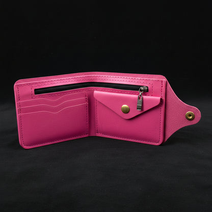 Pink leather wallet with zipper on a black background