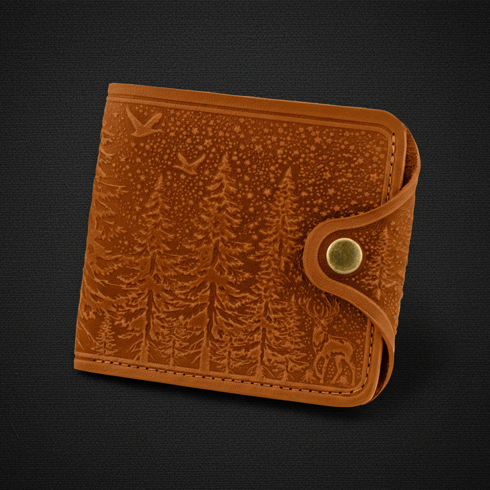 Brown leather wallet with embossed design on a black background