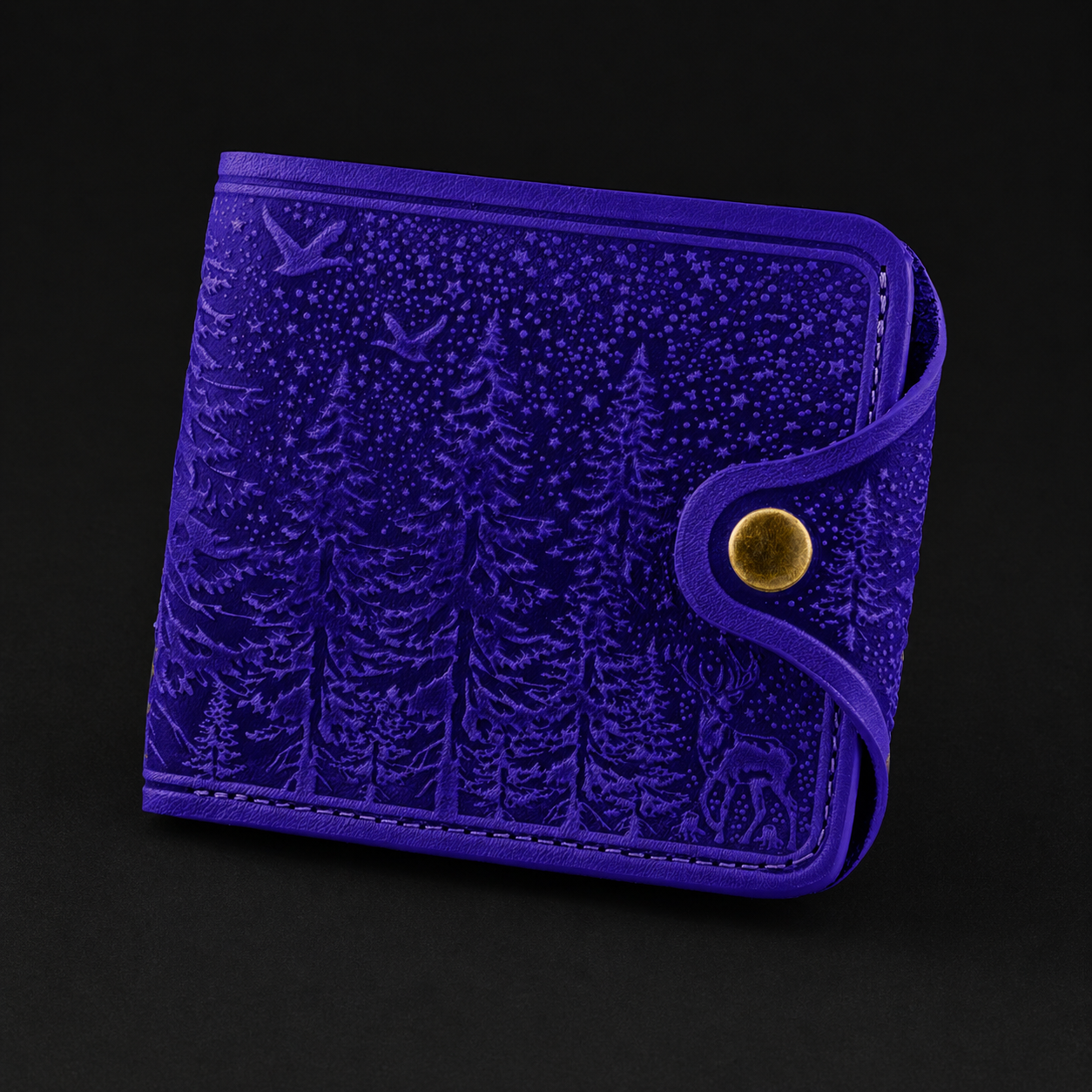 Blue textured wallet with a gold button on a black background