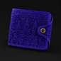 Blue textured wallet with a gold button on a black background