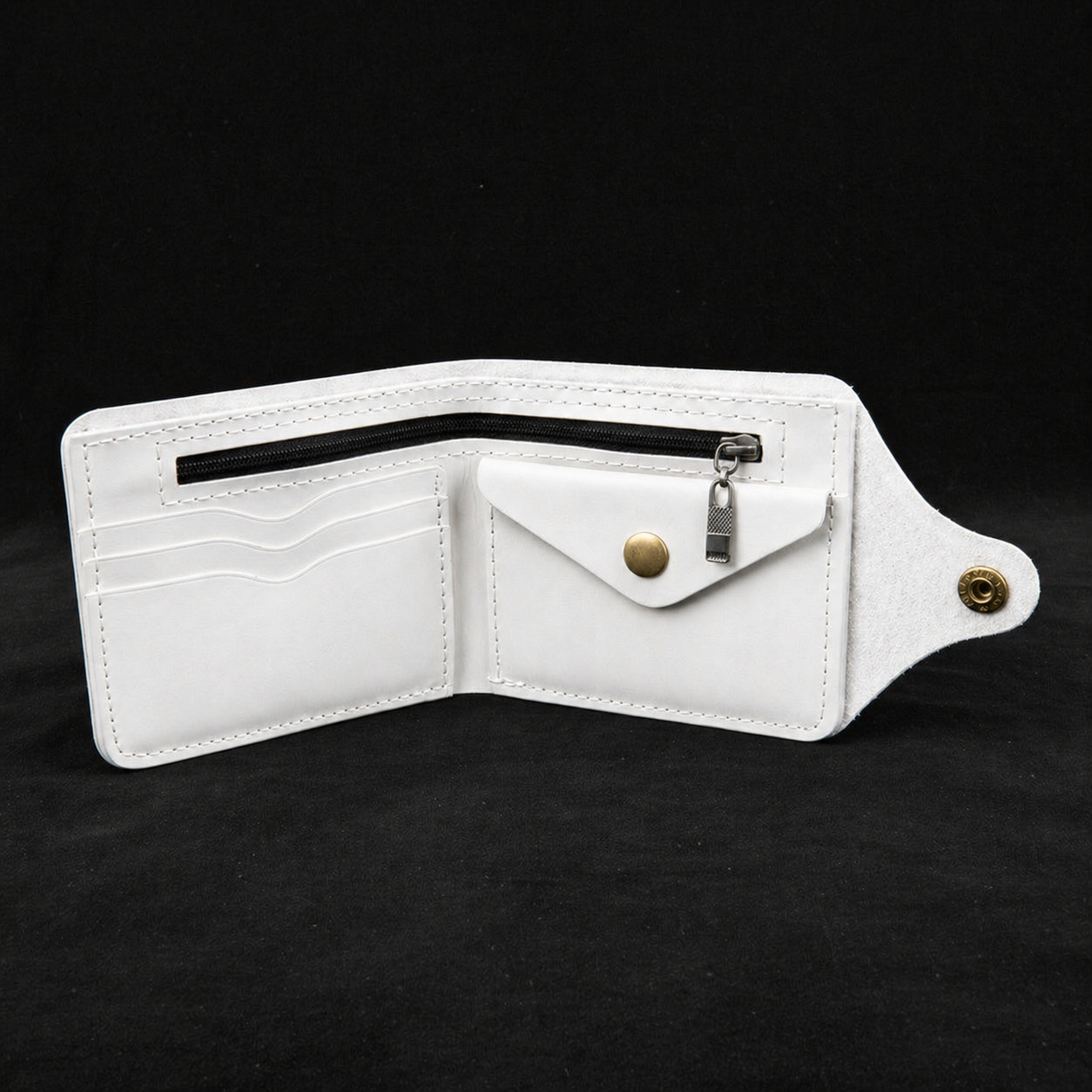 White wallet with gold accents on a black background